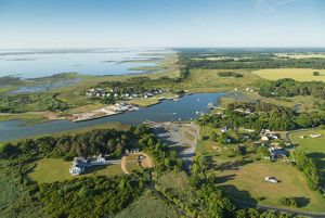 Aerial view of a community on the water's edge.